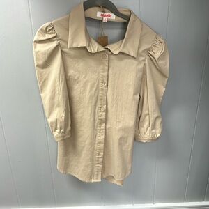 Brand new quarter length button up shirt with cutout back.
